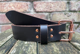 Plain leather 19mm-38mm wide belt with rose gold look steel single roller buckle. Choice of 12 colours