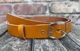 Plain leather 25mm wide belt with nickle plated steel buckle. Choice of 13 colours SBF24C