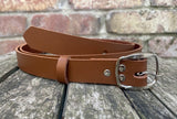 Plain leather 25mm wide belt with nickle plated steel buckle. Choice of 13 colours SBF24C