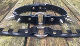 Spiked o-ring leather choker approx 19mm wide. Choice of 13 colours and spike size.