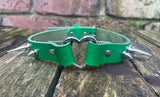 Spiked heart ring leather choker approx 19mm wide. Choice of 13 colours and spike size.