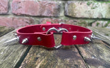 Spiked heart ring leather choker approx 19mm wide. Choice of 13 colours and spike size.