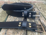 Plain leather 25mm wide belt with perforated steel or old brass roller buckle. Choice of 13 colours