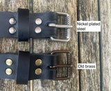 Plain leather 25mm wide belt with perforated steel or old brass roller buckle. Choice of 13 colours