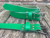 Plain leather 25mm wide belt with perforated steel or old brass roller buckle. Choice of 13 colours