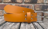 London tan plain leather belt with nickel plated steel roller buckle. Choice of width.