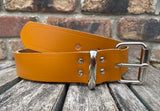 London tan plain leather belt with nickel plated steel roller buckle. Choice of width.