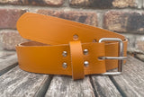 London tan plain leather belt with nickel plated steel roller buckle. Choice of width.