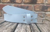 Baby blue plain leather belt with nickel plated steel roller buckle. Choice of width.