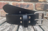 Plain leather 19mm-50mm wide belt with nickel plated steel light roller buckle. Choice of 13 colours