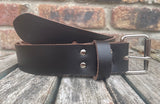 Plain leather 19mm-50mm wide belt with nickel plated steel light roller buckle. Choice of 13 colours