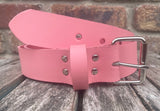 Pink plain leather belt with nickel plated steel roller buckle. Choice of width.
