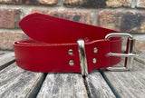 Red plain leather belt with nickel plated steel roller buckle. Choice of width.