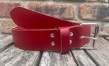 Red plain leather belt with nickel plated steel roller buckle. Choice of width.
