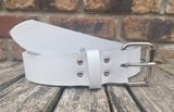 White plain leather belt with nickel plated steel roller buckle. Choice of width.