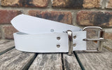 White plain leather belt with nickel plated steel roller buckle. Choice of width.
