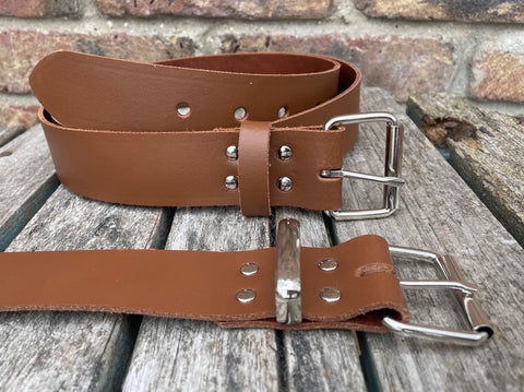 Chestnut Brown plain leather belt with nickel plated steel roller buckle. Choice of width.