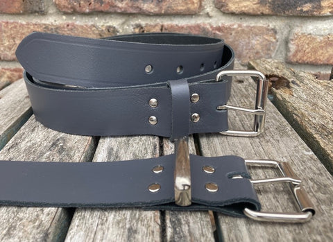 Grey plain leather belt with nickel plated steel roller buckle. Choice of width.