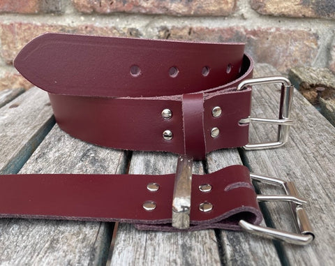 Oxblood plain leather belt with nickel plated steel roller buckle. Choice of width.