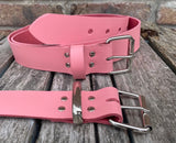Pink plain leather belt with nickel plated steel roller buckle. Choice of width.