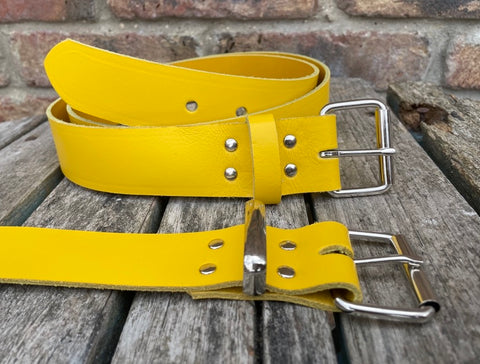 Yellow plain leather belt with nickel plated steel roller buckle. Choice of width.