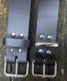 Plain leather 19mm-50mm wide belt with nickel plated steel light roller buckle. Choice of 13 colours