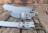 Plain leather 30mm wide belt with nickel plated zinc buckle. Choice of 13 colours Z9913