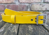 Plain leather 24mm wide belt with steel flat buckle in antique nickel finish. Choice of 12 colours