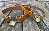 Front locking leather choker 10mm or 19mm wide. Choice of 13 colours.