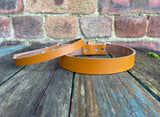 Plain leather choker 10mm or 19mm wide. Choice of 13 colours.