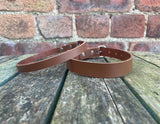 Plain leather choker 10mm or 19mm wide. Choice of 13 colours.